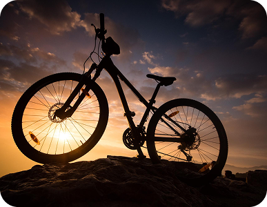 Mountain bike silhouette at sunset